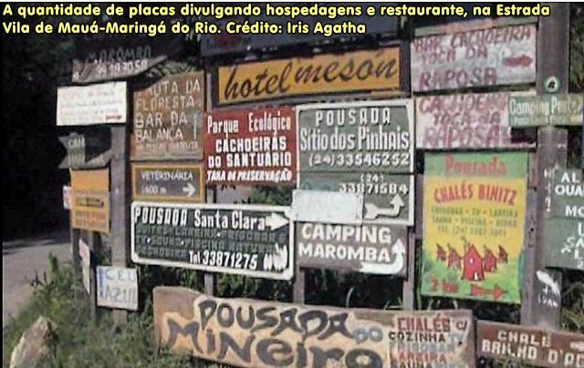 A quantidade de placas divulgando hospedagens e restaurante, na Estrada Vila de Mauá-Maringá do Rio. Crédito: Iris Agatha